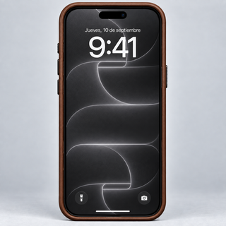 iPhone in the Tanner brown leather case, front view with the screen wallpaper visible
